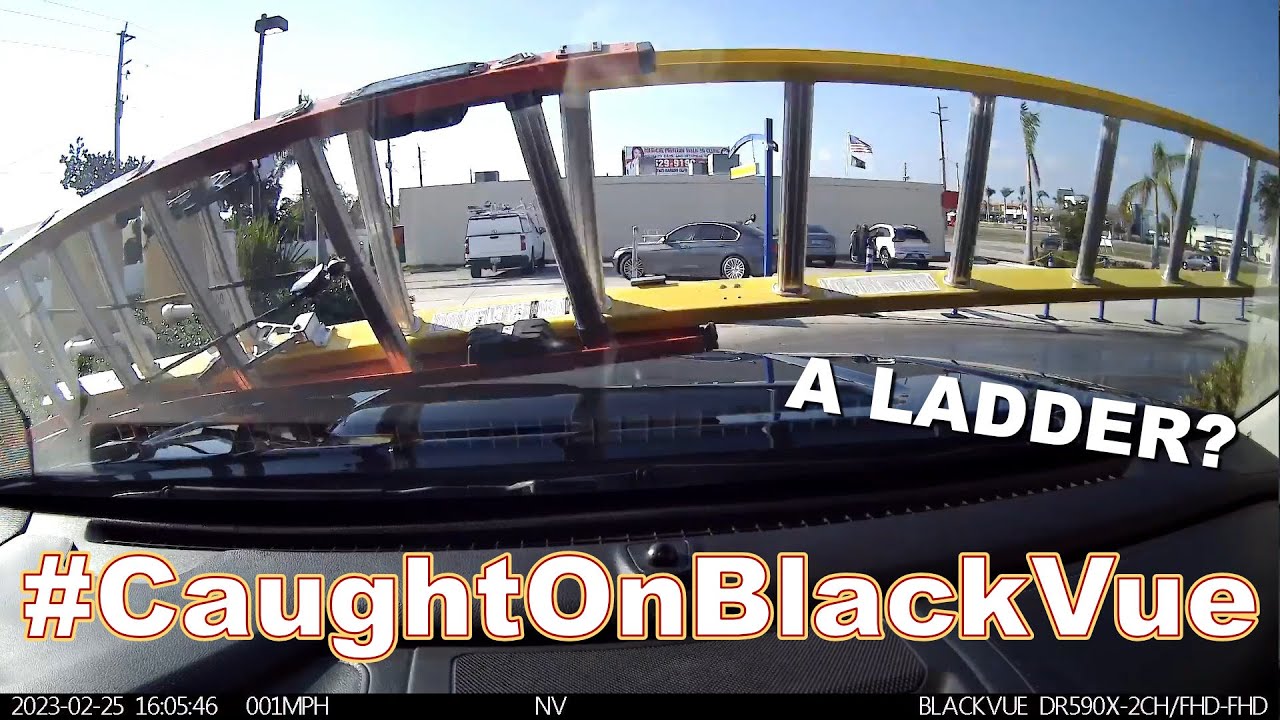 Falling Ladder Accident In A Car Wash #CaughtOnBlackVue